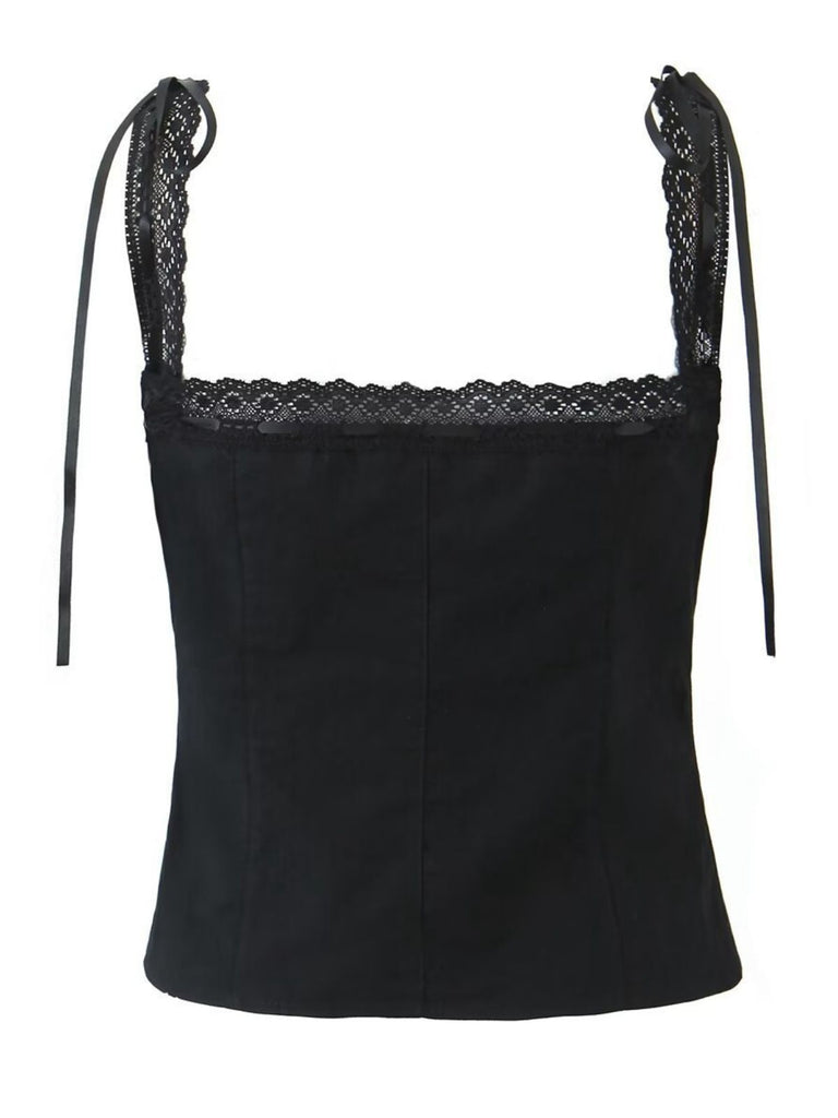 Black top with lace straps on a white background
