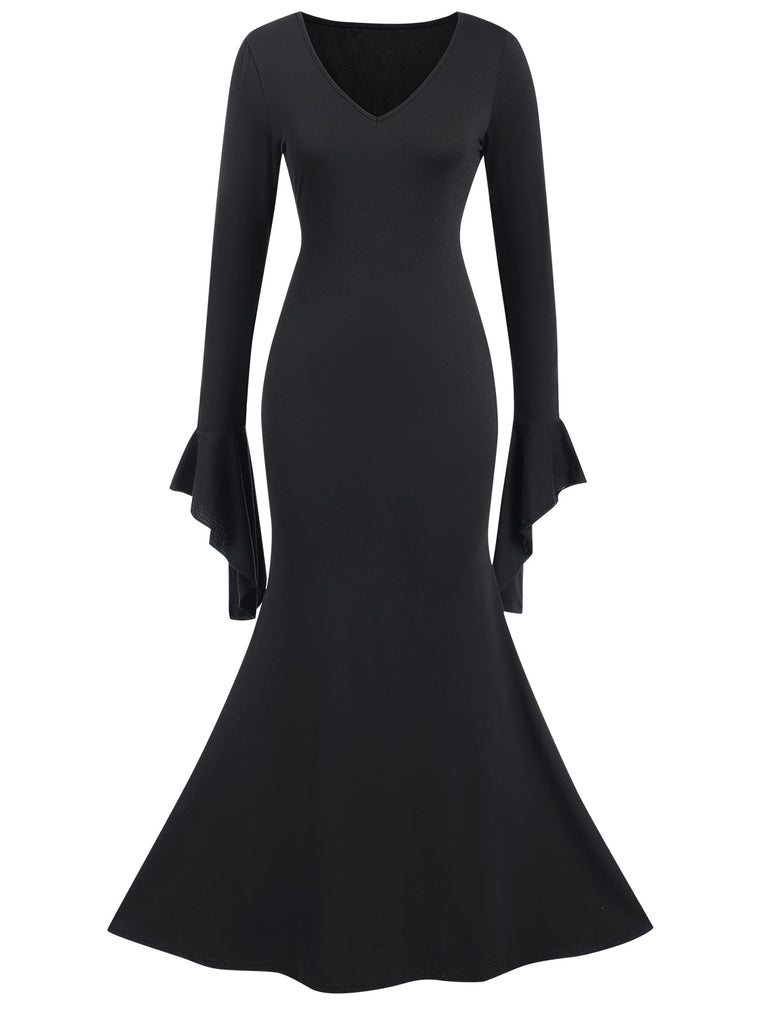 She slips into this Black 1930s Sold Batwing Cuffs Fishtail Dress and suddenly it's a 1930s daydream