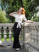 She walks in these Black 1930s Solid Suspender Pants and the world follows