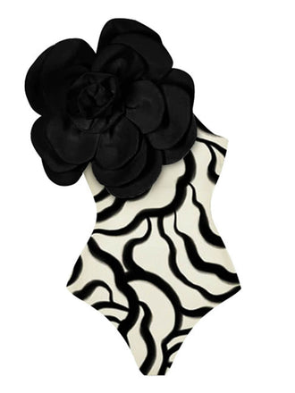 She's wearing Black 1940s 3D Camellia One Shoulder Swimsuit and the whole beach remembers the 1940s