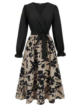 She slips into this Black 1940s Floral Silhouette Long Sleeved Dress and suddenly it's a 1940s daydream
