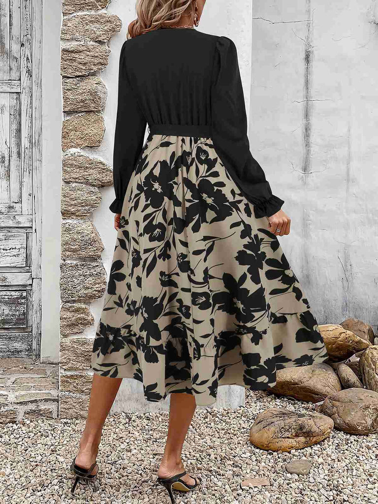 Black 1940s Floral Silhouette Long Sleeved Dress — a 1940s silhouette that turns sidewalks into runways
