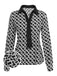 She pairs this Black 1940s Geometric Patchwork Ribbon Blouse with confidence and 1940s charm