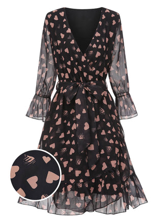 She slips into this Black 1940s Heart Sheer Sleeves Wrap Dress and suddenly it's a 1940s daydream
