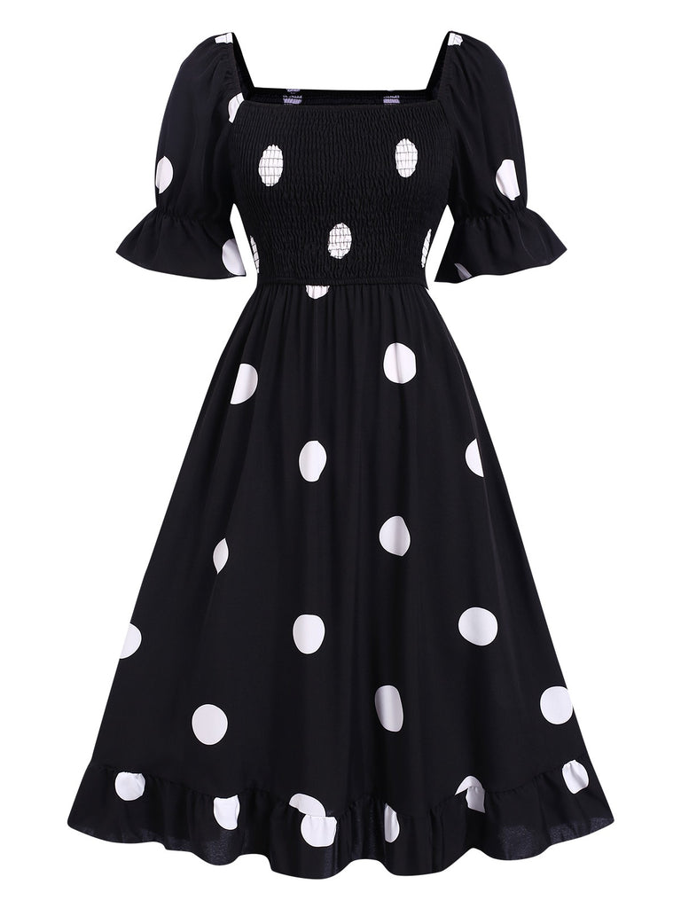 She slips into this Black 1940s Ruffle Cuffs Polka Dots Smocked Dress and suddenly it's a 1940s daydream