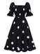 She slips into this Black 1940s Ruffle Cuffs Polka Dots Smocked Dress and suddenly it's a 1940s daydream