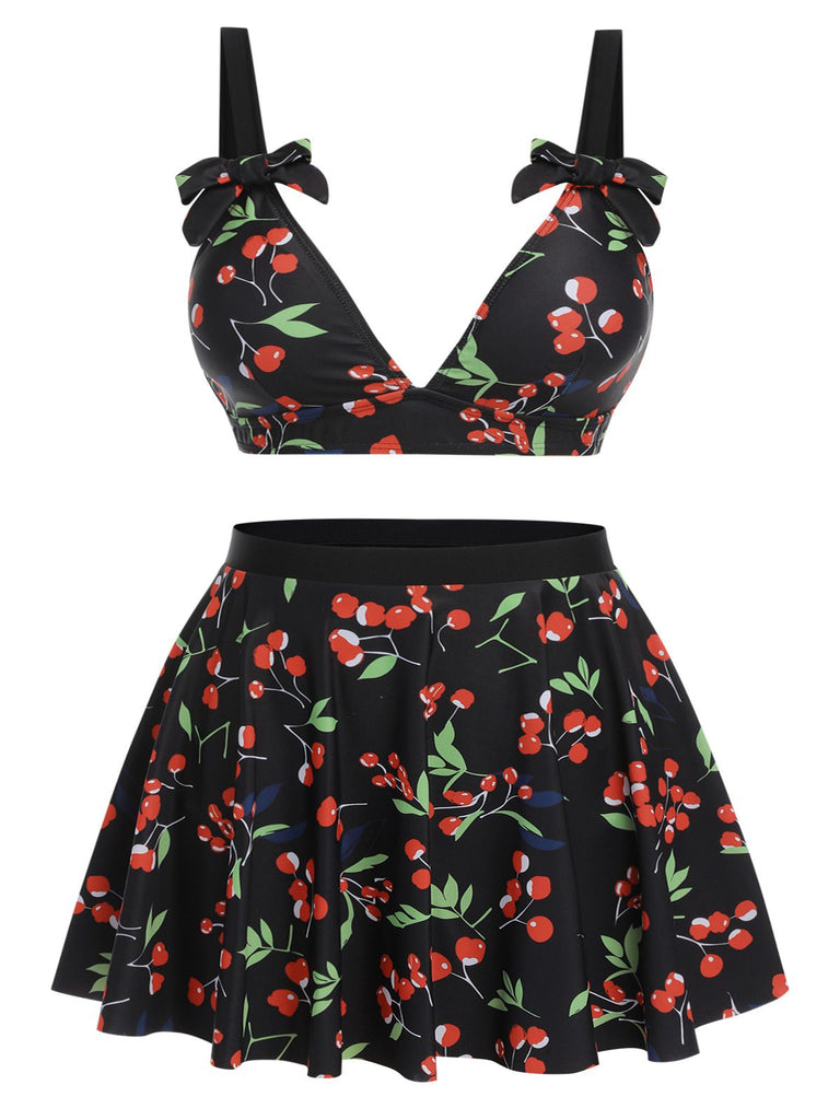 She's wearing Black 1950s Cherry Bow V-Neck Swimsuit and the whole beach remembers the 1950s