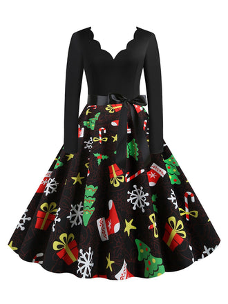 She slips into this Black 1950s Christmas Gift Tree Belted Dress and suddenly it's a 1950s daydream