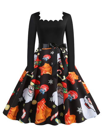 She slips into this Black 1950s Christmas Santa Belted Dress and suddenly it's a 1950s daydream