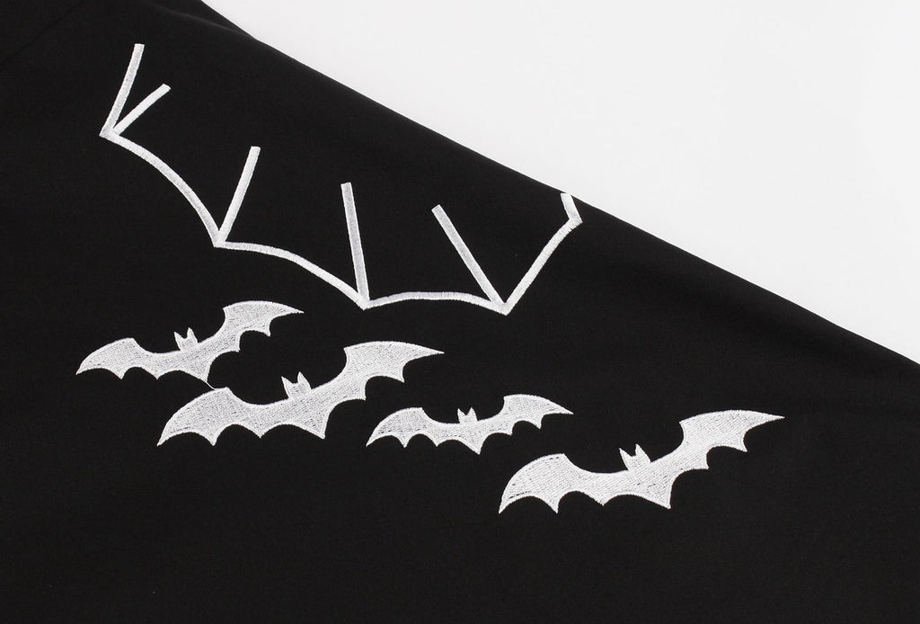 Black 1950s Halloween Bat Collar Embroidered Dress — the kind of 1950s dress that makes strangers smile