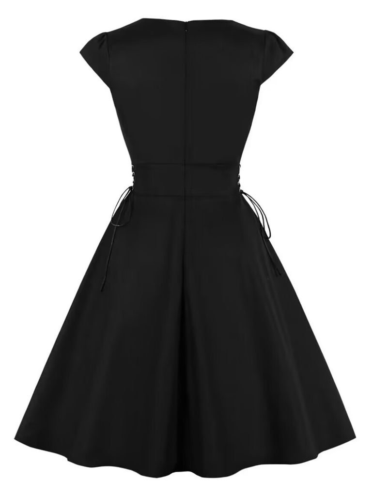 Black 1950s Halloween Bat Lace-Up Dress, vintage dress, retro fashion, rockabilly, pin-up fashion - perfect for women who love vintage and retro fashion