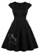 She slips into this Black 1950s Halloween Bat Lace-Up Dress and suddenly it's a 1950s daydream