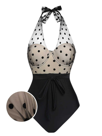 She's wearing Black 1950s Halter Polka Dots Mesh Swimsuit and the whole beach remembers the 1950s