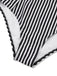 Close-up of a black and white striped fabric with a textured border.