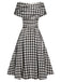 Black 1950s Houndstooth Short Sleeve Belted Dress — vintage elegance for the modern woman