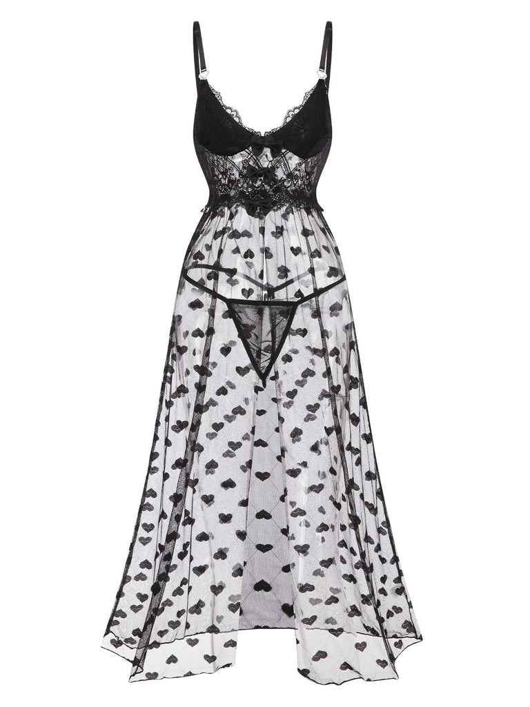 She slips into this Black 1950s Lace Hearts Mesh Nightgown and suddenly it's a 1950s daydream