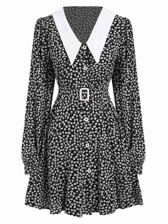 She slips into this Black 1950s Lapel Lantern Sleeves Ditsy Floral Dress and suddenly it's a 1950s daydream