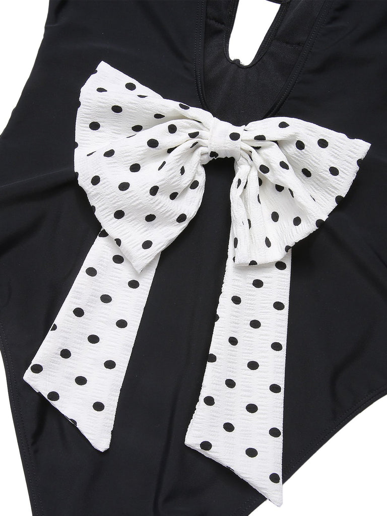 Black 1950s Polka Dot V-Neck Bow Swimsuit, vintage swimsuit, pin-up swimwear - perfect for women who love vintage and retro fashion