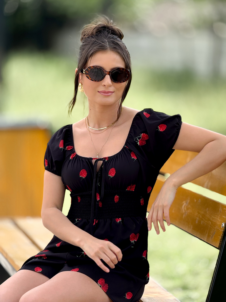 She finds her 1950s story in this Black 1950s Raspberry Puff Sleeves Romper