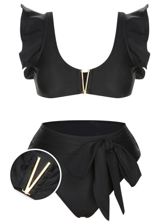 She's wearing Black 1950s Ruffle Sleeve Split Swimsuit and the whole beach remembers the 1950s