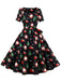 She slips into this Black 1950s Santa Claus Christmas Dress and suddenly it's a 1950s daydream
