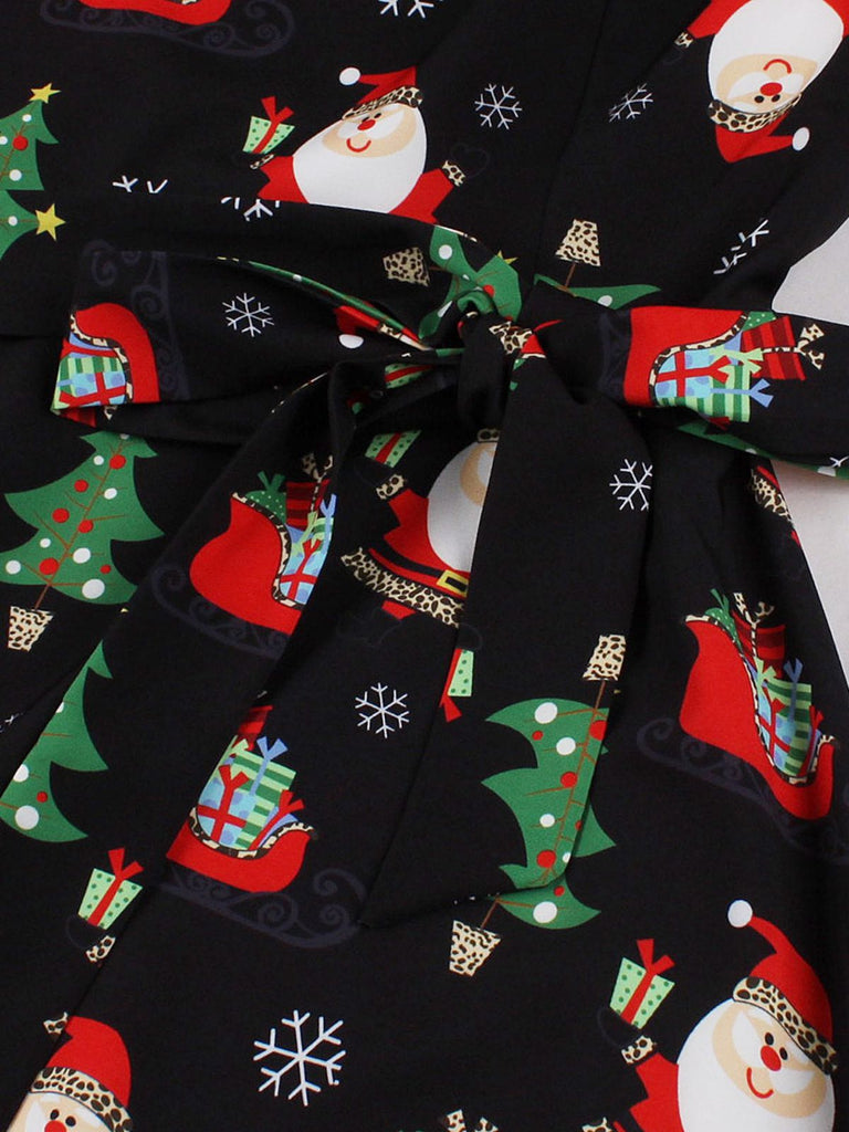 This Black 1950s Santa Claus Christmas Dress wraps her in 1950s elegance, one twirl at a time