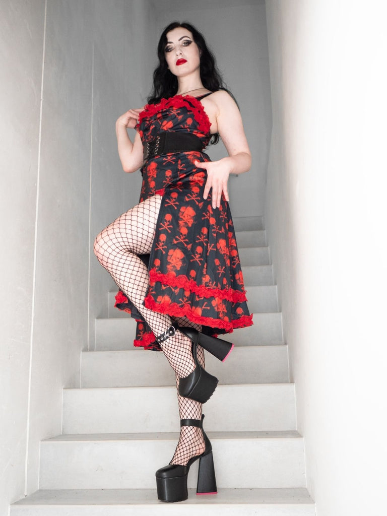 She slips into this Black 1950s Skull Lace Strap Dress and suddenly it's a 1950s daydream