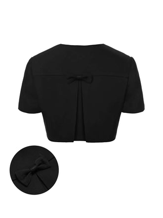 She throws on this Black 1950s Solid Bow Short Jacket and the city feels like 1950s Paris