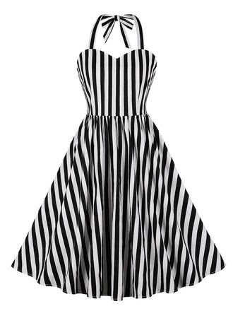 She slips into this Black 1950s Vertical Stripes Halter Dress and suddenly it's a 1950s daydream