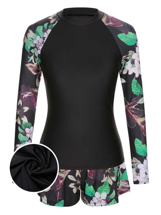 She's wearing Black 1960s Floral Swimsuit Set and the whole beach remembers the 1960s