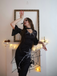 She slips into this Black 1960s Halloween Spider Net Bell Pencil Dress and suddenly it's a 1960s daydream