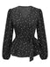 She pairs this Black 1960s Heart Dots V-Neck Belted Blouse with confidence and 1960s charm