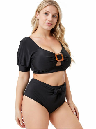 She's wearing Black 1960s Solid Hollow Puff Swimsuit and the whole beach remembers the 1960s