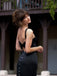She slips into this Black 1960s Solid Pearl Buttons Suspender Dress and suddenly it's a 1960s daydream