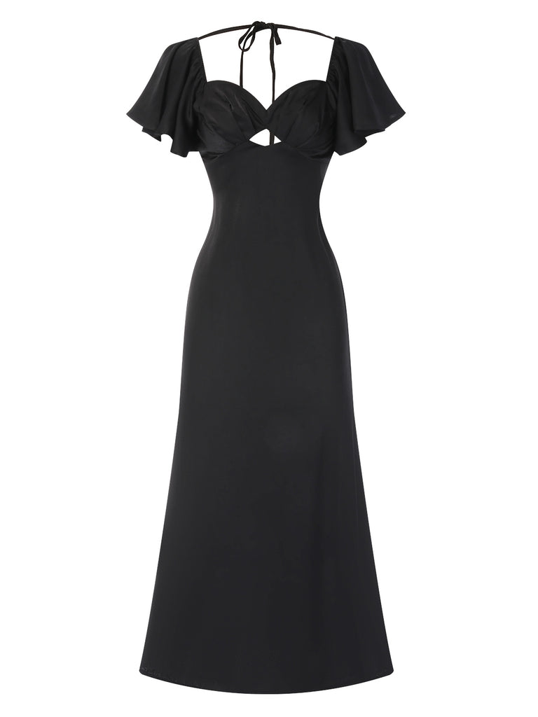 She slips into this Black 1970s Hollow Sweetheart Neck Dress and suddenly it's a 1970s daydream