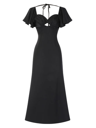 She slips into this Black 1970s Hollow Sweetheart Neck Dress and suddenly it's a 1970s daydream