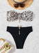 This Black 1970s Leopard Metal Button Strapless Swimsuit carries 1970s vacation dreams in every stitch