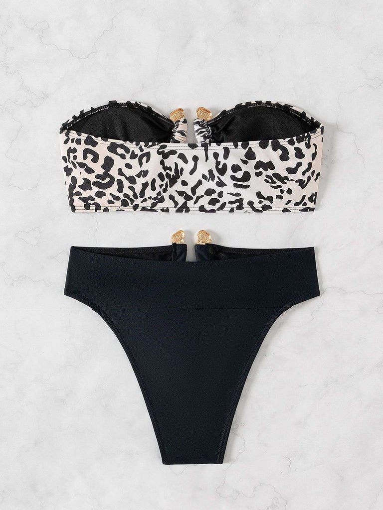 Black 1970s Leopard Metal Button Strapless Swimsuit — because 1970s glamour never goes out of style