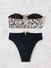 Black 1970s Leopard Metal Button Strapless Swimsuit — because 1970s glamour never goes out of style