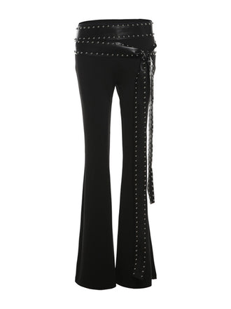 She walks in these Black 1980s Steampunk Bootcut Rivet Pants and the world follows