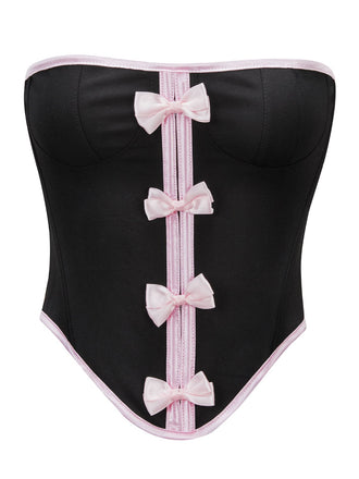 She slips into Black 1980s Steampunk Bowknots Bandeau Corset and channels 1980s screen sirens