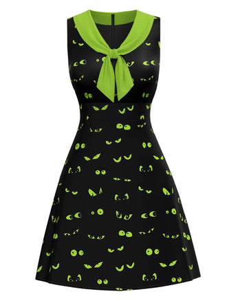 She slips into this Black & Green 1960s Halloween Demon Eyes Dress and suddenly it's a 1960s daydream