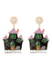 She adds this Black Halloween Cartoon Haunted House Earrings and suddenly it's vintage perfection
