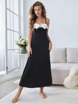 She slips into Black & White 1930s Bowknot Suspender Sleepwear and channels 1930s screen sirens