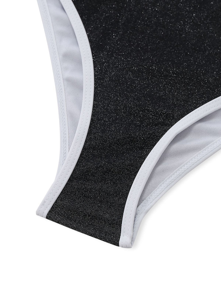 Black swimsuit top with white mesh lining on a white background