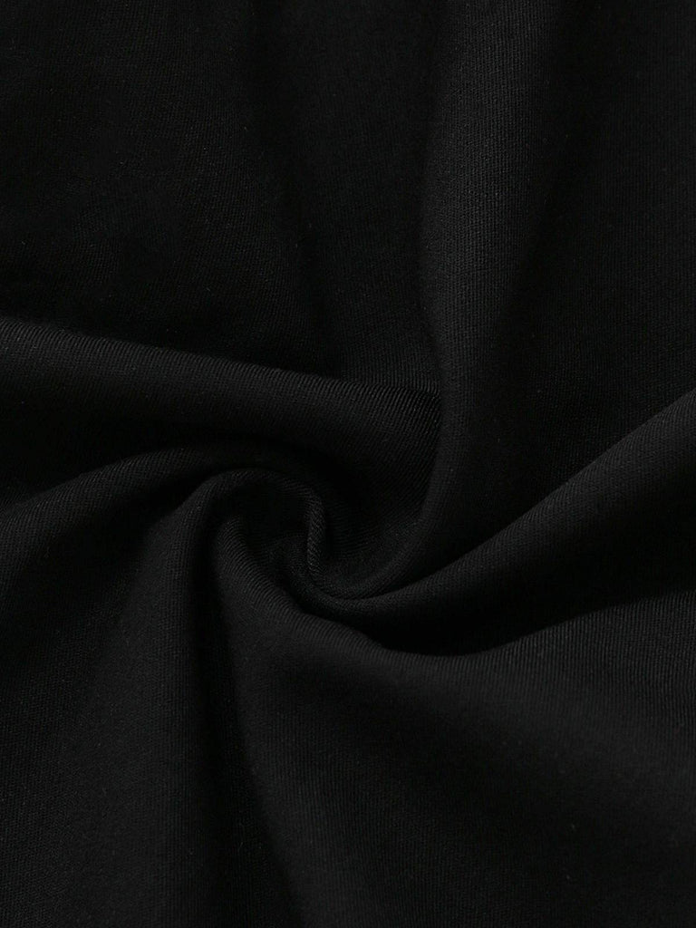 Close-up of black fabric with folds