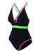 Black swimsuit with green and pink accents on a white background