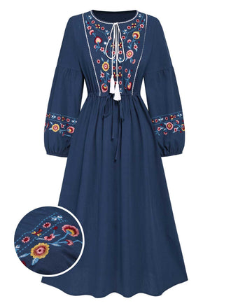 She slips into this Blue 1940s Embroidered Floral Lantern Sleeve Dress and suddenly it's a 1940s daydream