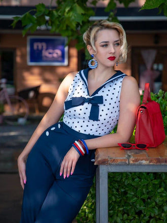 She finds her 1940s story in this Blue 1940s Polka Dot Bow Lapel Jumpsuit