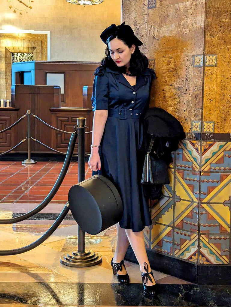 She slips into this Blue 1940s Solid Short Sleeves Lapel Dress and suddenly it's a 1940s daydream